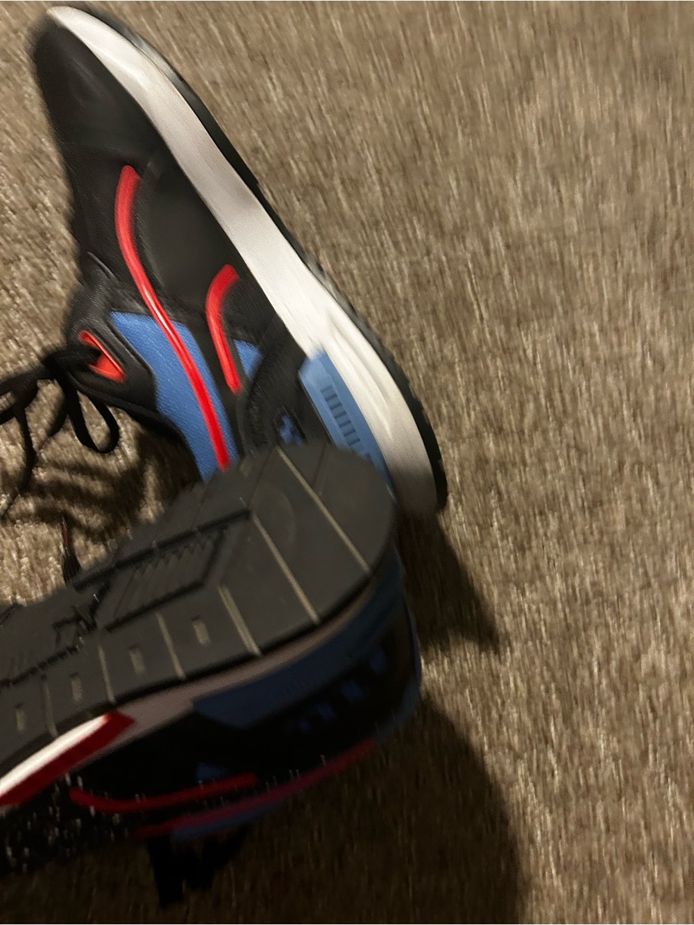 Puma Men's Black Sneakers with Blue and Red Accents